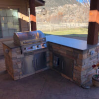 Durango, Colorado, residential, single family, architecture, site design, landscape architecture, general contractor, durango contractor, wood, design build, durango builder, hardscape, remodel, custom, concrete, integral color concrete, stamped concrete, outdoor kitchen, grill, backyard living, outdoor living, pergola, shade structure, stone veneer, culture stone, granite countertop